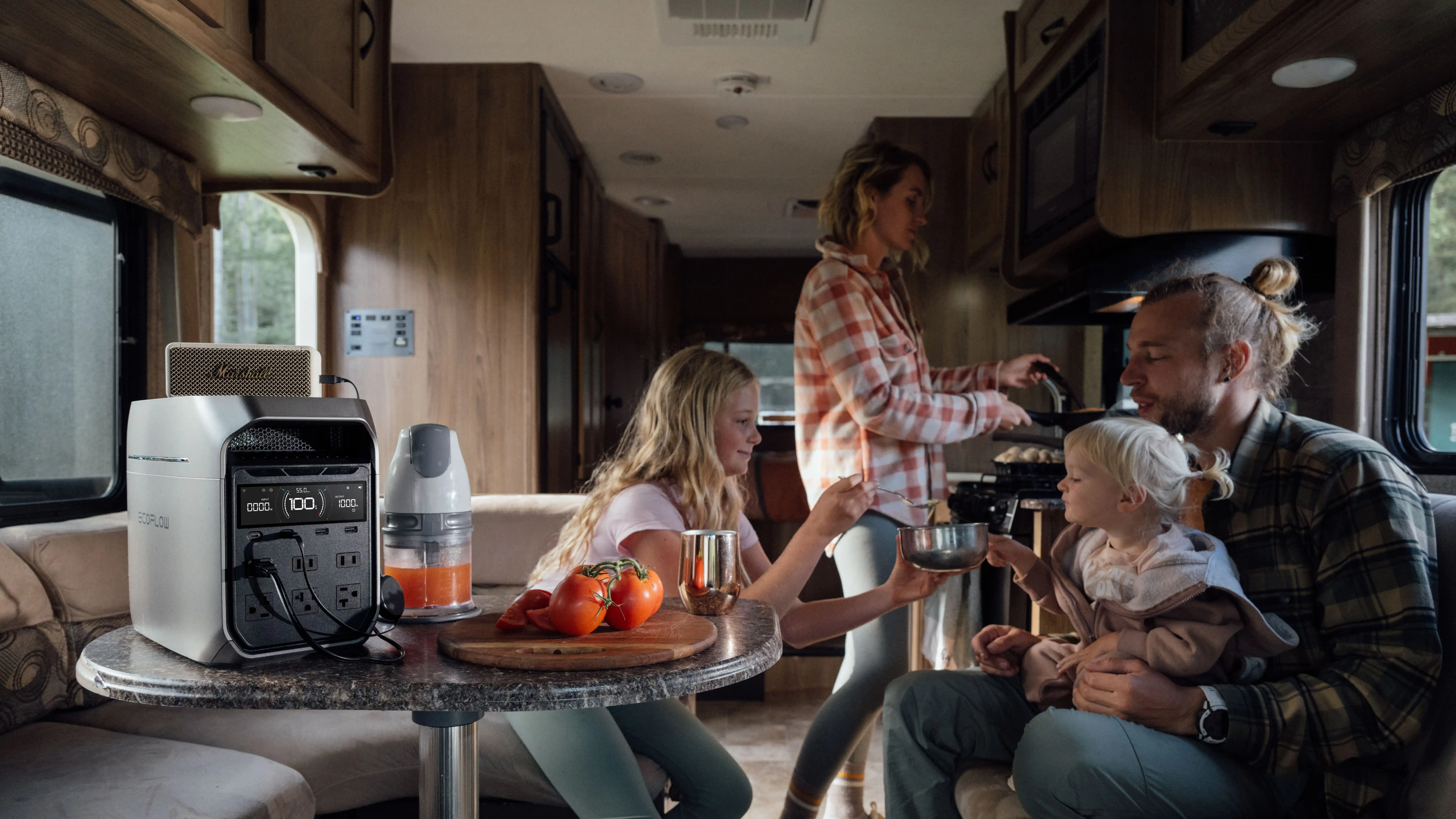 EcoFlow DELTA 3 Plus powering kitchen appliances for a family cooking and eating inside an RV during a cozy road trip.