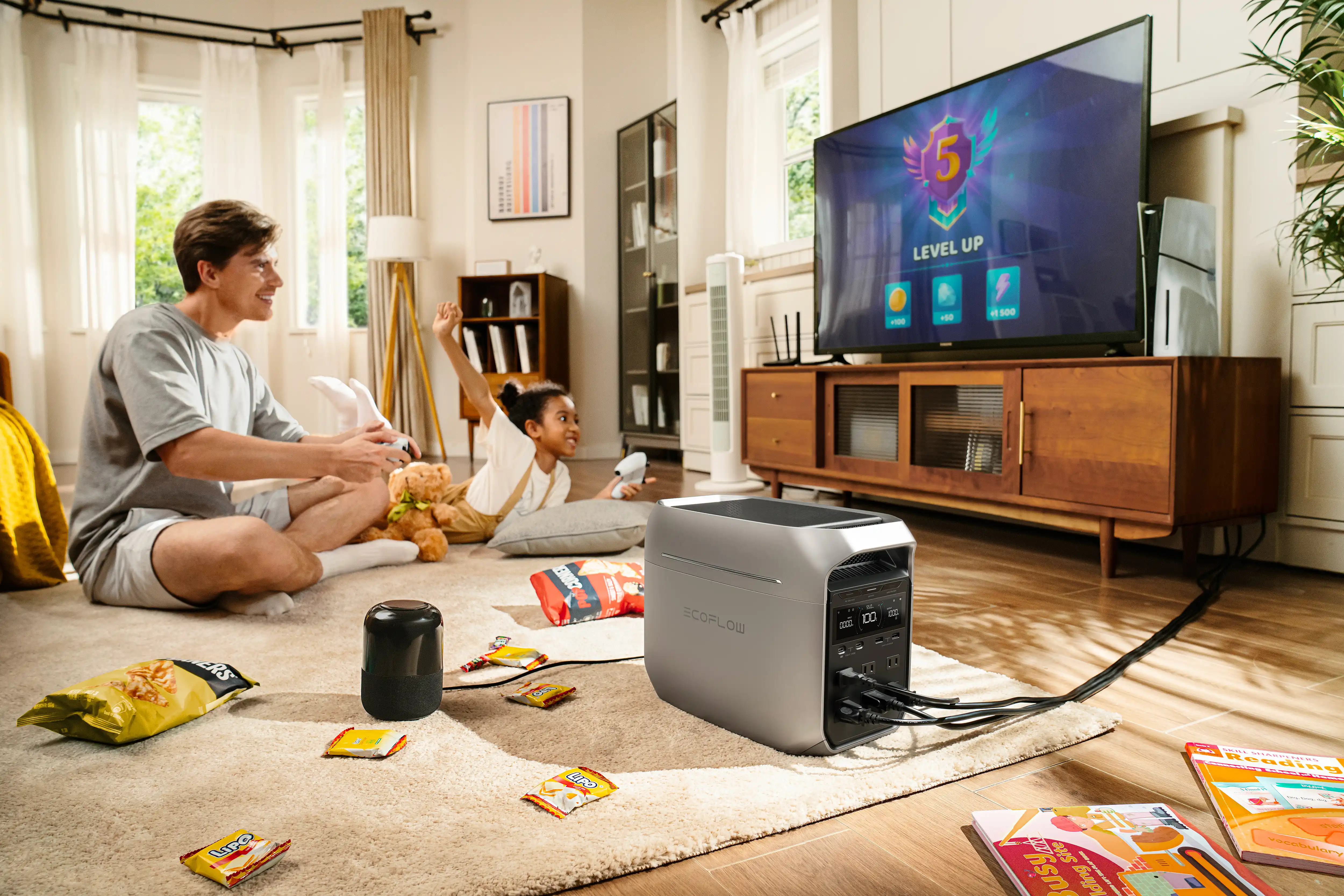 EcoFlow DELTA 3 Plus backup power keeps the TV and gaming setup running for a father and daughter enjoying video games at home.