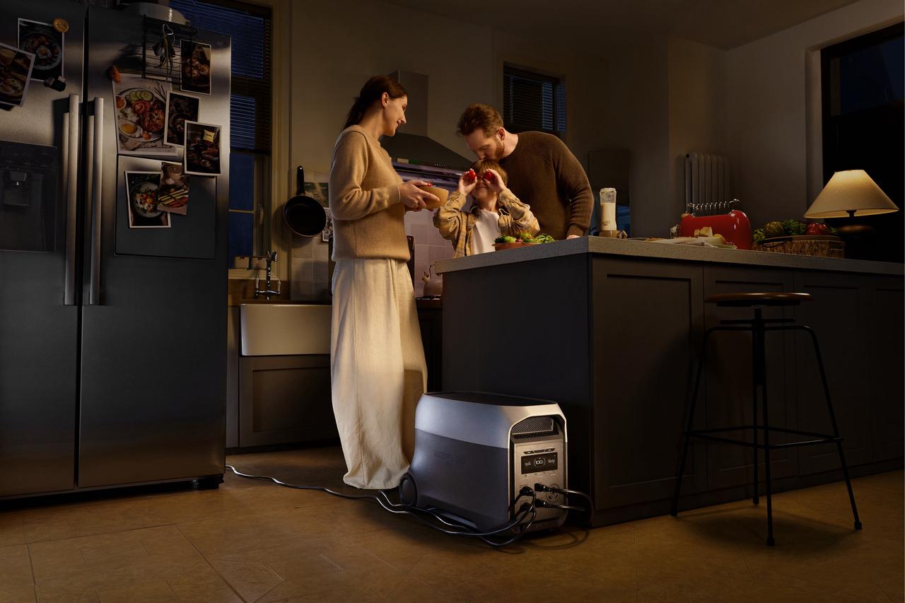 EcoFlow DELTA 3 Ultra Plus portable power station powering kitchen appliances for a family cooking together at home during a blackout