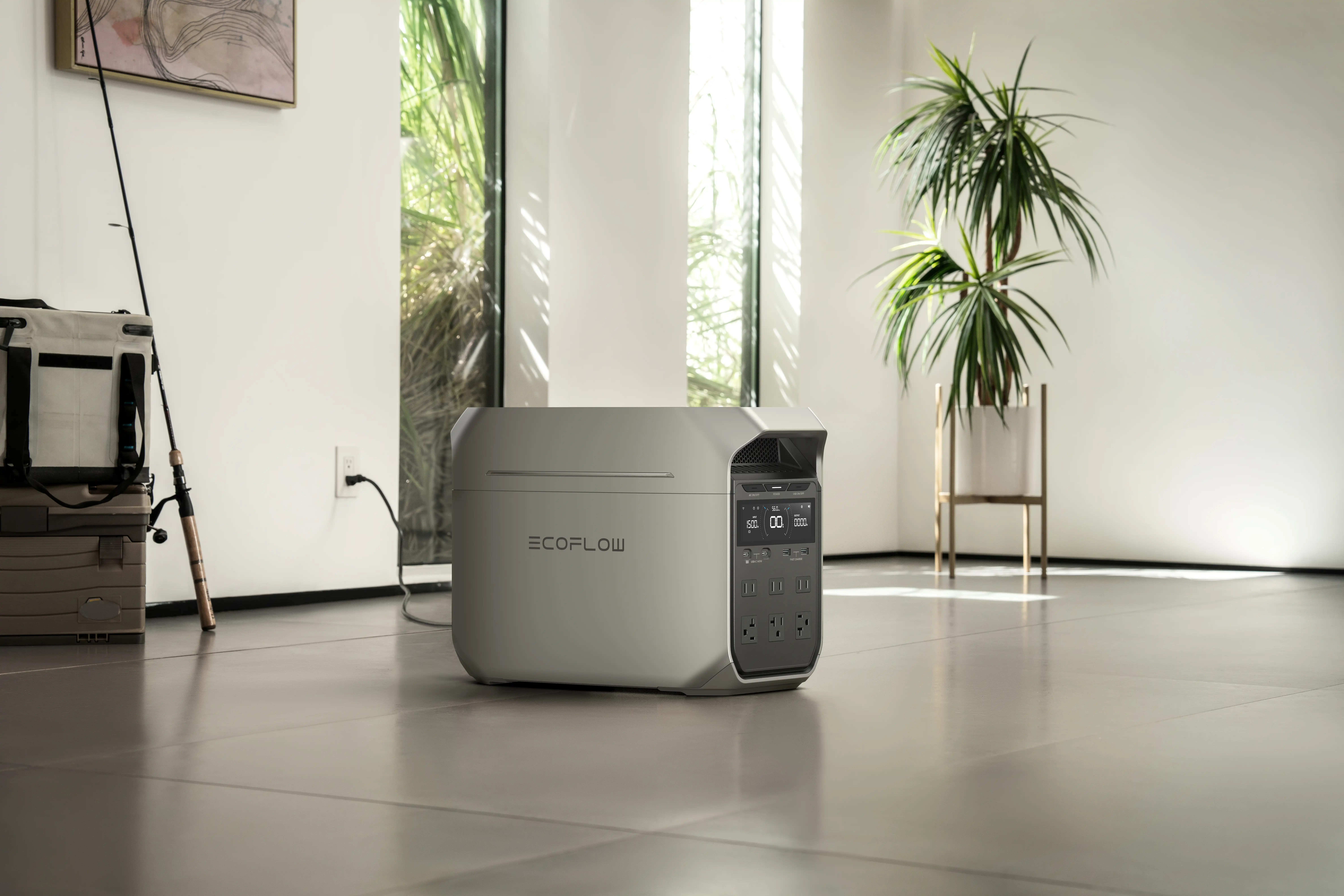 EcoFlow DELTA 3 Plus portable power station charges via household wall outlet in bright modern room, high-capacity backup battery for home power outages and fishing gear pre-charging preparation