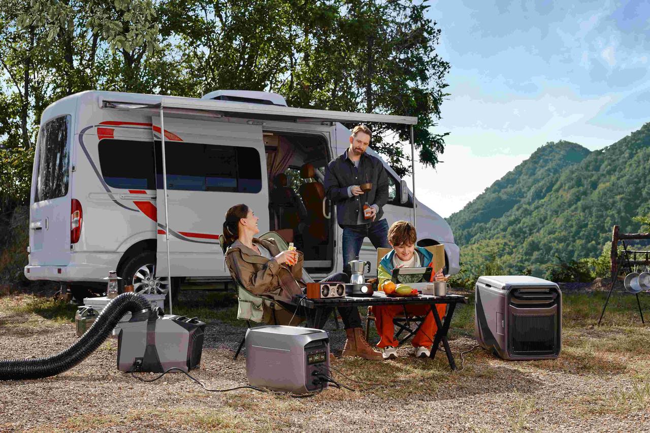 EcoFlow DELTA 3 Max Plus portable power station supplies power for portable air conditioner and camping table devices at daytime RV campsite, high-capacity battery creates comfortable cool outdoor leisure for family trips